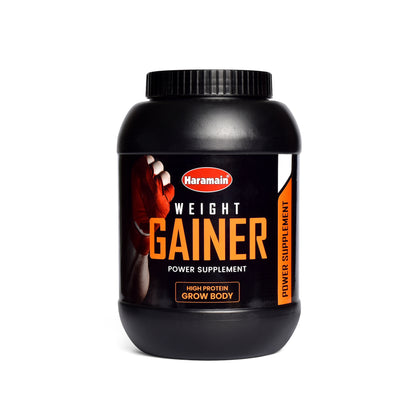 Black Haramain Weight Gainer supplement jar with orange label and screw cap